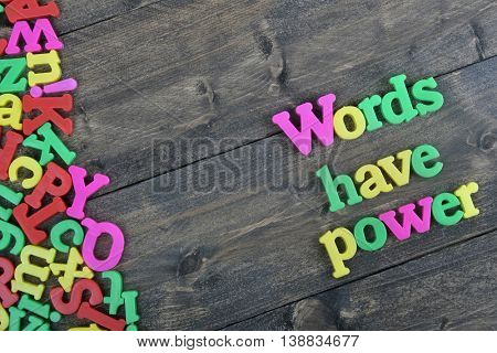 Words have power word on wooden table