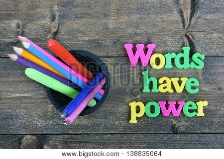 Words have power word on wooden table