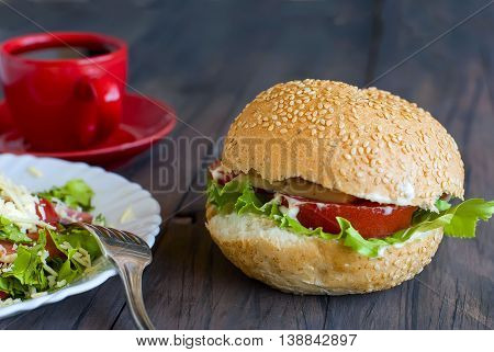 Salad, A Burger And A Cup Of Coffee For Breakfast