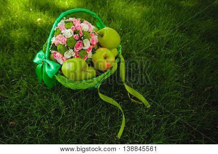 Close view of beautiful colorful wedding bouquet with green apple