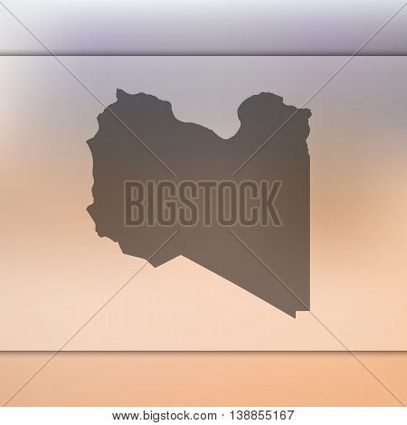 Libya map on blurred background. Blurred background with silhouette of Libya. Libya. Libya map. Blurred background.