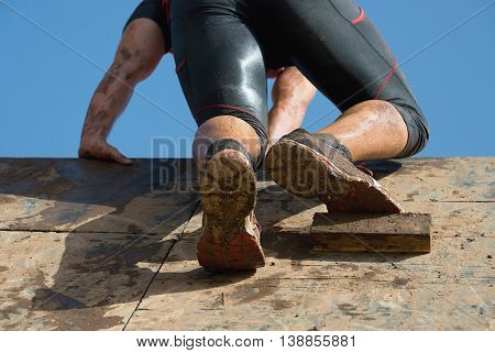 Mud race runners extreme run action sport