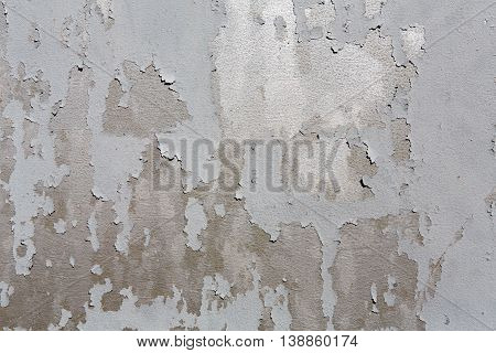 Rustic shabby painted metal texture abstract background. Weathered surface of gray iron damaged grunge wall with old paint spots.