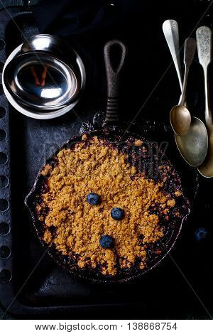 Crumble with a plum and berry. style vintage. top view. selective focus