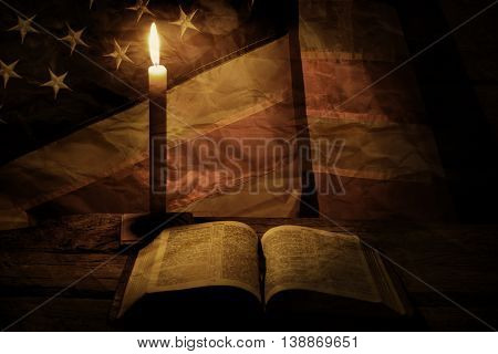 Old american flag and candle. Burning candle near a book. Wisdom comes with time. Learn the right things.