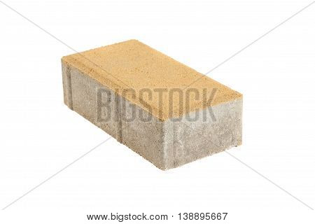 Single yellow pavement brick isolated. Concrete block for paving