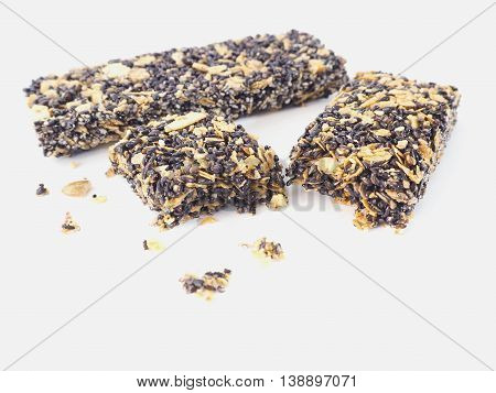 Healthy granola. Organic munchies bars on white background.
