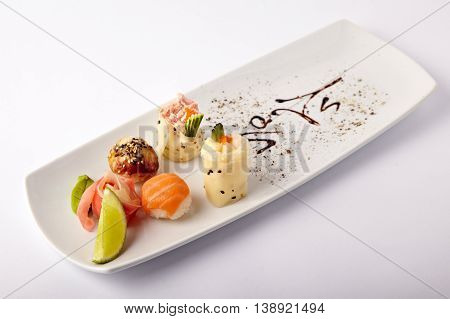 Set of different sushi on white background