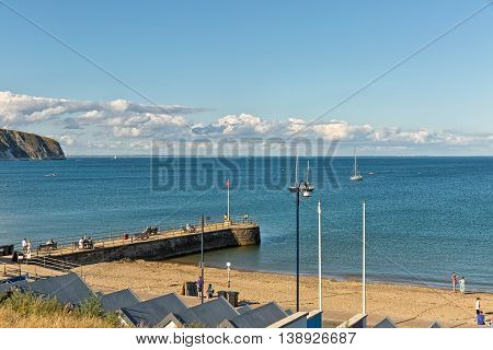 Swanage Dorset UK - July 2016. A view of Swanage bay looking towards Bournemouth and Old Harry rock at Swanage in Dorset UK