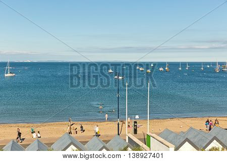 Swanage Dorset UK - July 2016. A view of Swanage bay looking towards Bournemouth and Old Harry rock at Swanage in Dorset UK