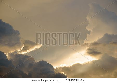 Background Of Golden Storm Clouds At Sunset.