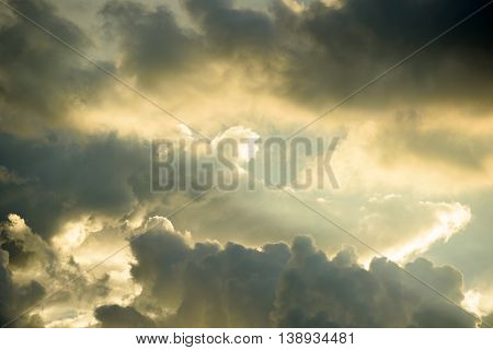 Background Of Golden Storm Clouds At Sunset.