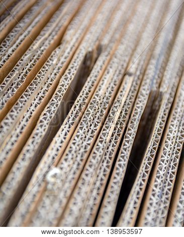 Brown corrugated cardboard useful as a blurred background