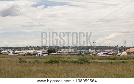 JUBA, SOUTH SUDAN-NOVEMBER 6, 2013: UN and World Food Program helicopters sit on the runway in Juba, South Sudan