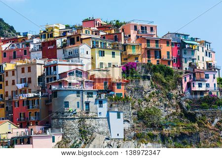 colorful houses built at a hill in Manarola Cinque Terre Italy