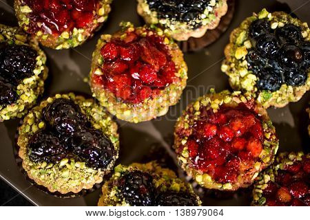 Dessert Fruit tartlets with strawberries and blueberries