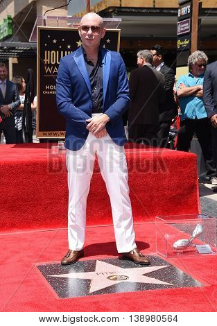 LOS ANGELES - JUL 15:  Pitbull aka Armando Christian Perez arrives to the Walk of Fame honors Pitbull on July 15, 2016 in Hollywood, CA                