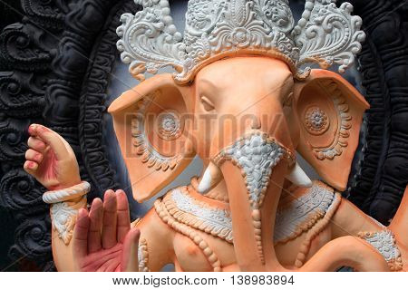 KOLKATA WEST BENGAL INDIA - 13 SEPTEMBER 2015: Beautiful fresh painted clay idol of Lord Ganesha at Kumartuli as preparation for "Durga Puja' festival in Kumartuli Kolkata capital of West Bengal India. It is the biggest festival of Hinduism.