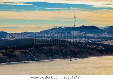 View Of San Francisco Skyline With Twin Peaks And Sutro Tower On A Cloudy Day