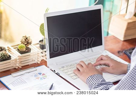 Businesswomen Using Laptop Working  In Coffee Shop.