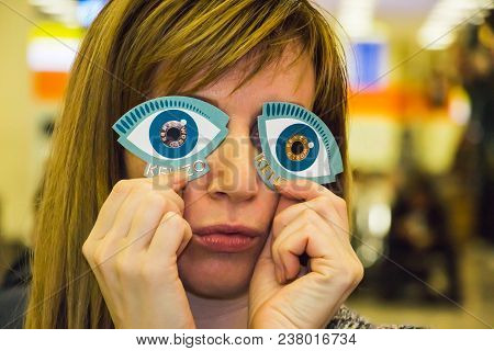 Moscow, Russia - December 19, 2017: Girl In A Beauty Shop Duty Free At The Airport Holding A Painted