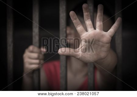 The Child Was Locked Up In A Steel Cage, A Concept Stopping Violent Acts Against Children.