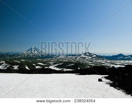View To Viluchinsky Volcano From The Caldera Of Mutnovsky At Kamchatka Peninsula, Russia