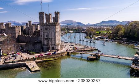 Aerial View Of The Historic Castle Caernafon, Gwynedd In Wales - United Kingdom.
