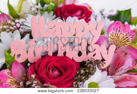 Inscription Is Happy Birthday On The Flowers. Beautiful Festive Composition.