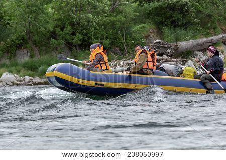 Kamchatka Peninsula, Russian Far East - July 15, 2016: Summer Rafting On Bystraya River In Gloomy Cl
