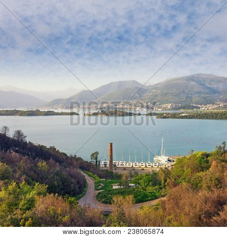 Misty Mediterranean Landscape. Montenegro, Bay Of Kotor, View Of Islands Of Sveti Marko And Miholjsk