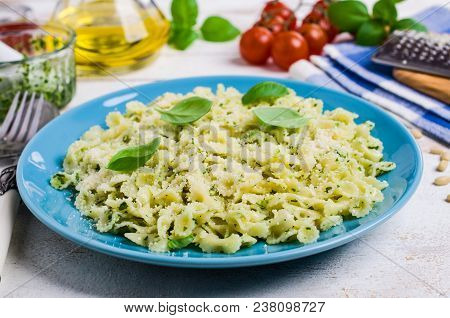 Traditional Italian Pasta With Pesto In A Plate On The Table. Selective Focus.