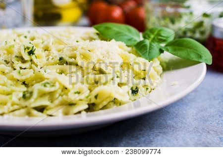 Traditional Italian Pasta With Pesto In A Plate On The Table. Selective Focus.