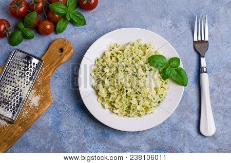 Traditional Italian Pasta With Pesto In A Plate On The Table. Selective Focus.