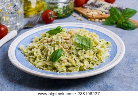 Traditional Italian Pasta With Pesto In A Plate On The Table. Selective Focus.