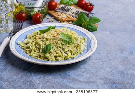Traditional Italian Pasta With Pesto In A Plate On The Table. Selective Focus.
