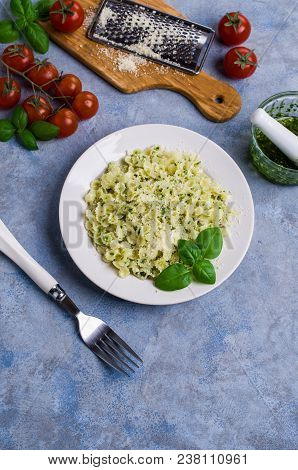 Traditional Italian Pasta With Pesto In A Plate On The Table. Selective Focus.