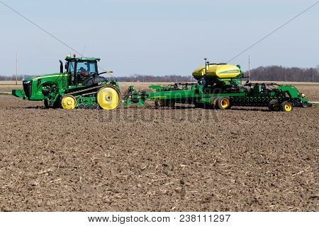 Point Isabel - Circa April 2018: John Deere 8335 Rt And Ccs Seed Delivery Tractors. Deere Manufactur