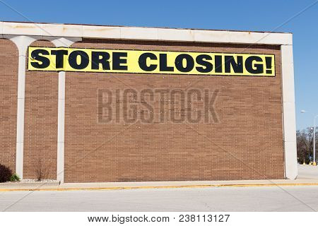 Store Closing Sign On A Department Store Going Out Of Business