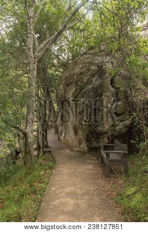 A Bench Next To A Boulder On The Hiking Trail To The Cascades Near Mahai In The Kwazulu-natal Draken