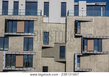 Contemporary design of multifamily living houses. Modern luxury apartments buildings