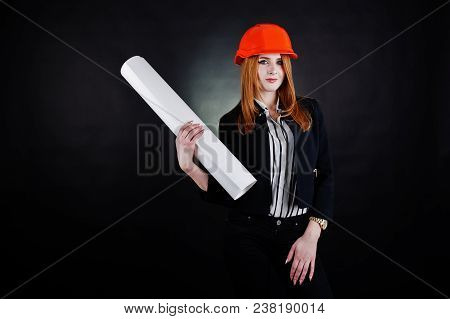 Engineer Woman In Orange Protect Helmet With Construction Paper Projekt.