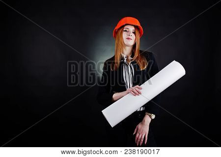Engineer Woman In Orange Protect Helmet With Construction Paper Projekt.