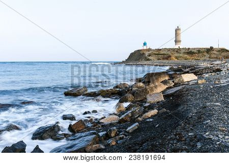 View Of The Lighthouse And Chapel On The Peninsula Bolshoy Utrish, Krasnodarskiy Region, Russia On T