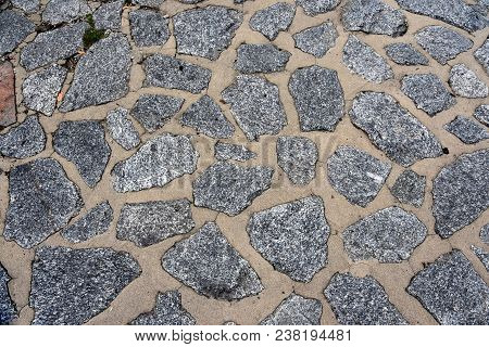 Made From Pebble Gravel Stones Different Shape As Floor Texture Background. Small Rocks Background T