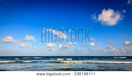 Scenic view of Caribbean Sea and blue sky with white clouds in BVI