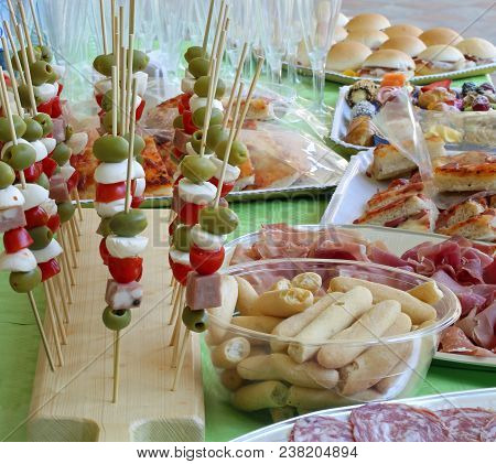 Italian Caprese Skewers With Tomato Mozzarella Green Olives And More Foods Like Sandwiches And Salam