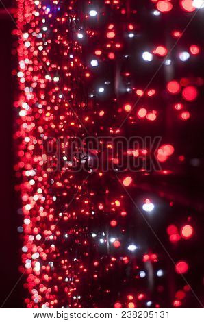 Red Christmas Lights Background. Creating A Festive Mood