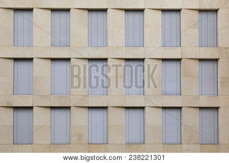 Facade Of Generic Office Building With Closed Shutter Blinds