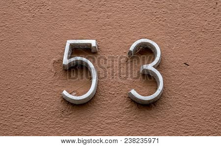 A Street Number 53  In Neutral Background Texture